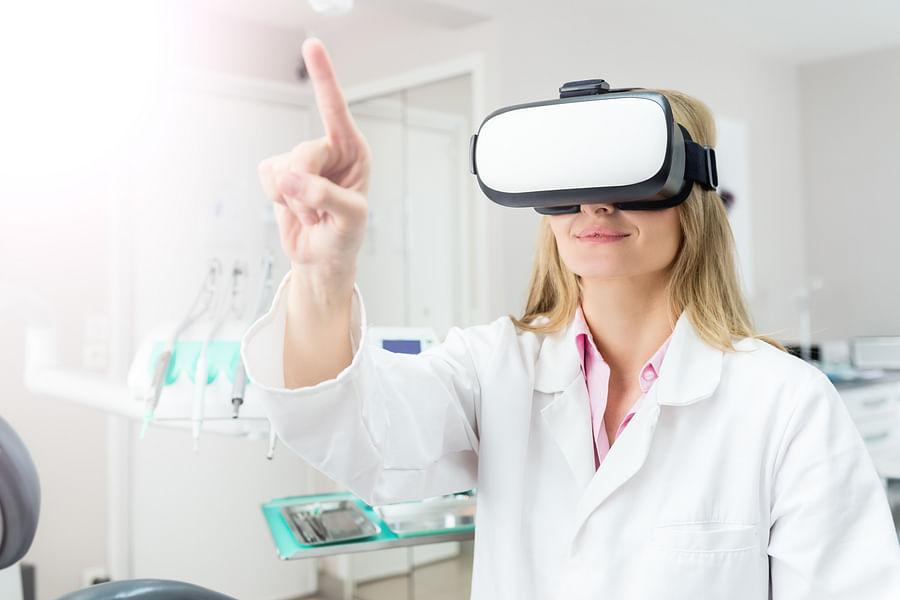 Dentist using Augmented Reality technology for a dental procedure